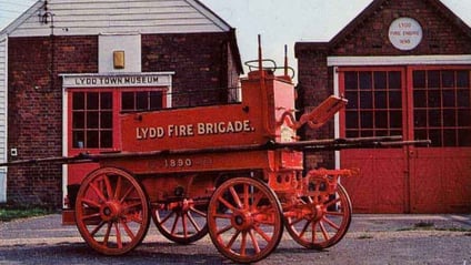 The 1890 Lydd Fire Brigade horse-drawn fire engine outside Lydd Town Museum